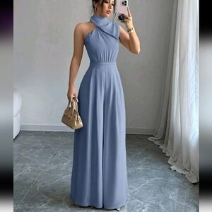 Sophisticated Blue Halter Jumpsuit with Flowing Silhouette